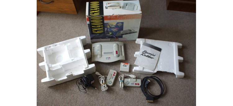 GX4000 Amstrad Games Console with Gamepads/controllers, Burnin' Rubber Game, Power Supply, Scart & Box